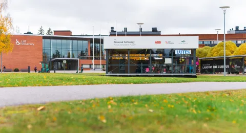 A temporary glass building in front of the LUT University.