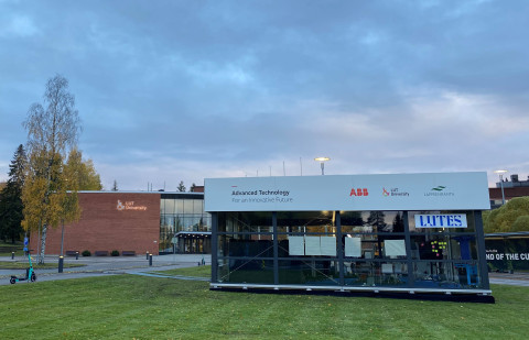 A temporary glass building in front of the LUT University.